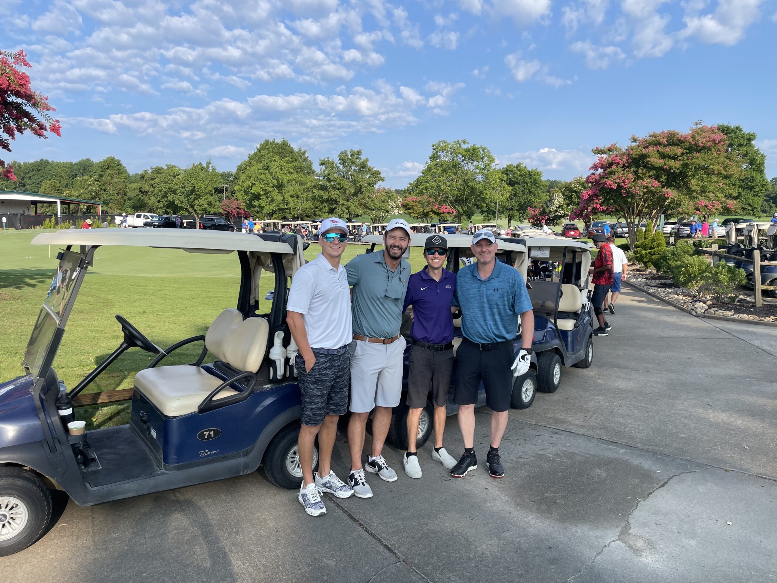 JMD, SLS, Mike in front of golf